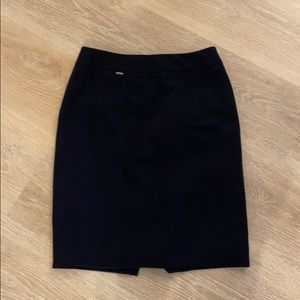 Dark blue pencil skirt.